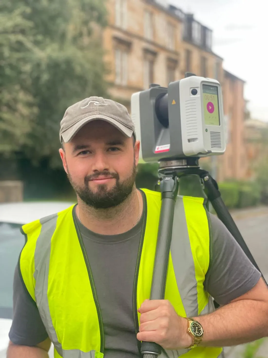 Connor Milton MCIAT, founder of Kanna Spatial, with a Leica RTC360 laser scanner in Glasgow's West End