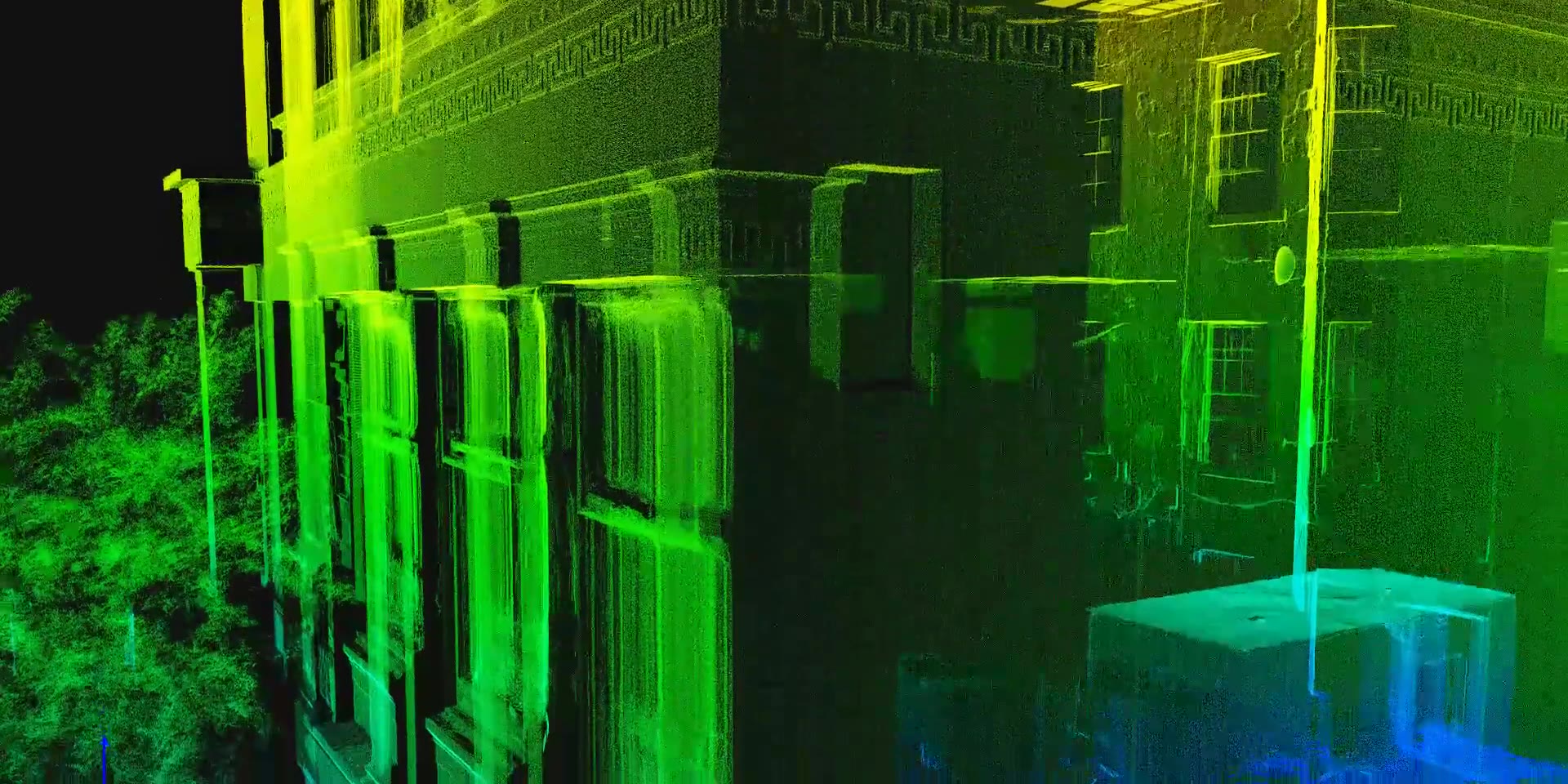 Close-up of the elevation-coloured point cloud at the corner of the building, showing the frieze and window surrounds